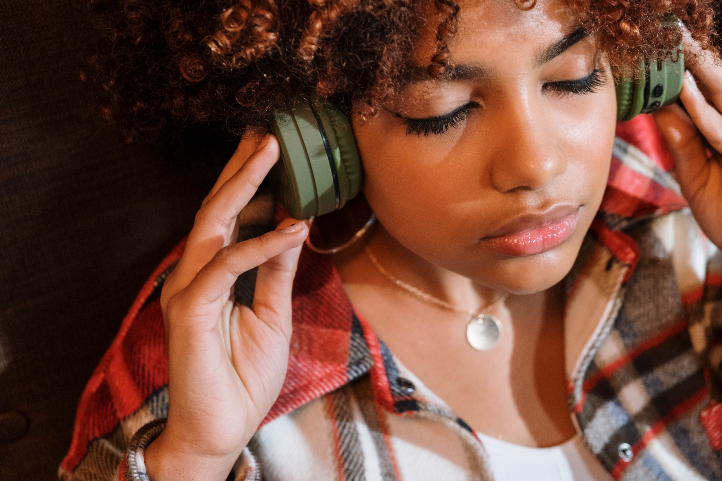 A Woman Wearing Headphones